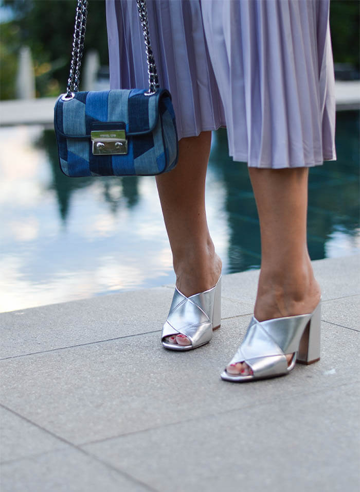 Outfit: Metallic Pleated Skirt, Marble Shirt, Silver Mules and Michael Kors Patchwork Denim