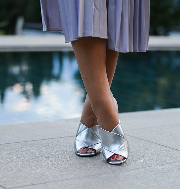 Outfit: Metallic Pleated Skirt, Marble Shirt, Silver Mules and Michael Kors Patchwork Denim