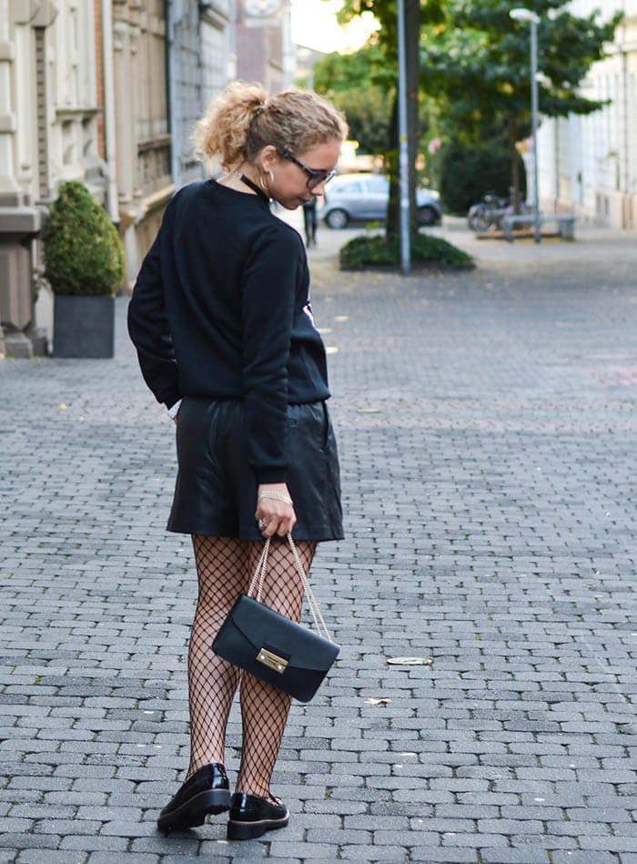 Outfit: Statement Sweater, Leather Shorts, Fishnet Stockings and Patent Loafer
