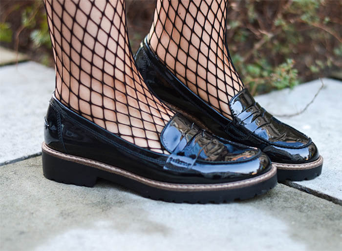 Outfit: Statement Sweater, Leather Shorts, Fishnet Stockings and Patent Loafer